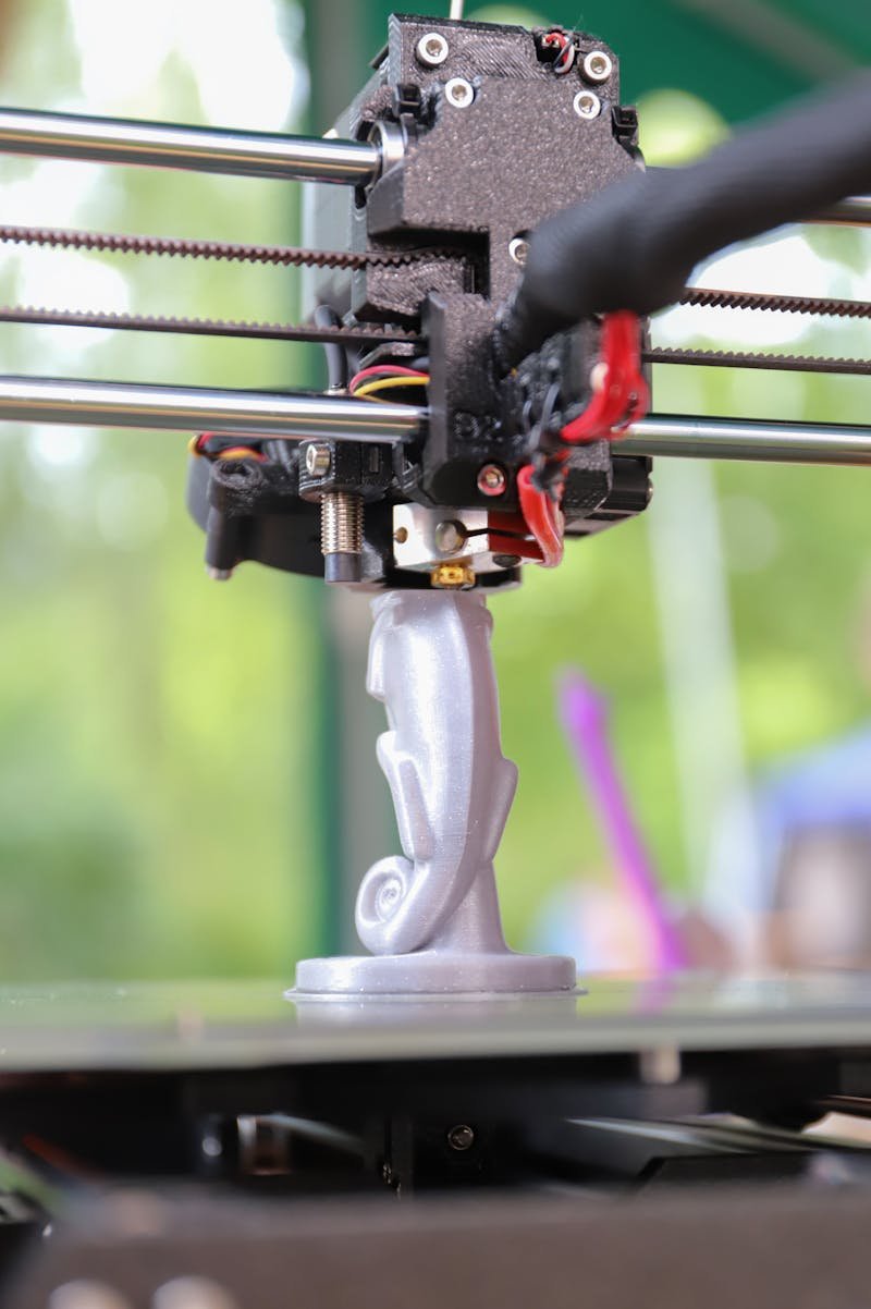 3D printer creating a prototype — test your product before investing in injection mold tooling